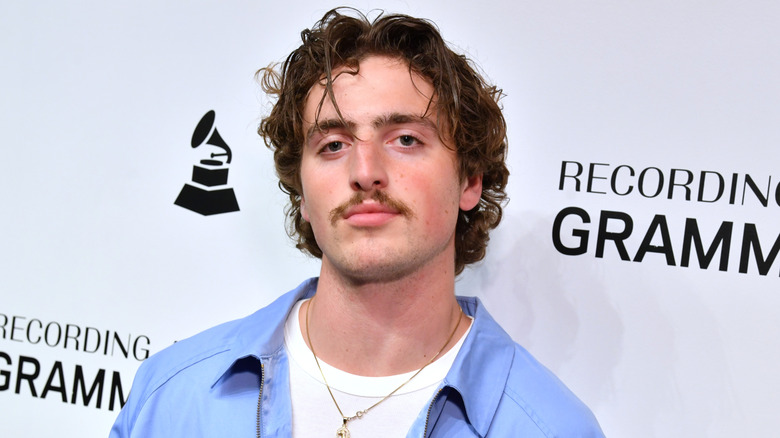 Benson Boone looks at the camera