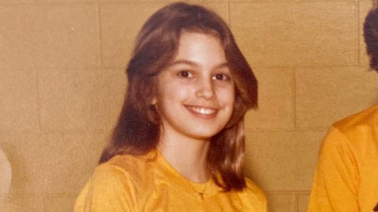 Cindy Crawford in middle school smiling