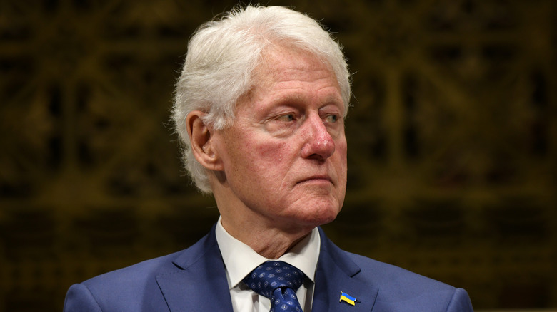 Bill Clinton looking solemn