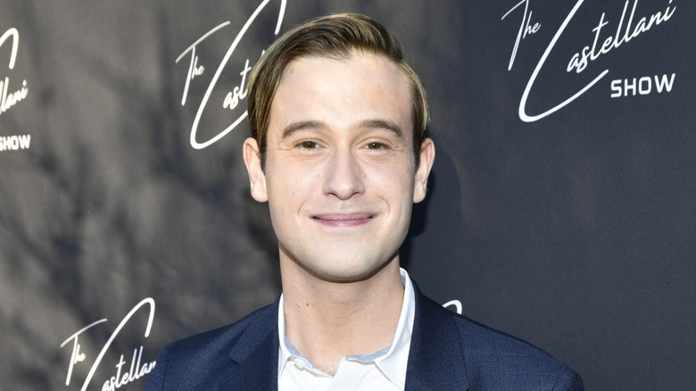 Tyler Henry smiling at "The Castellani Show" premiere in 2021