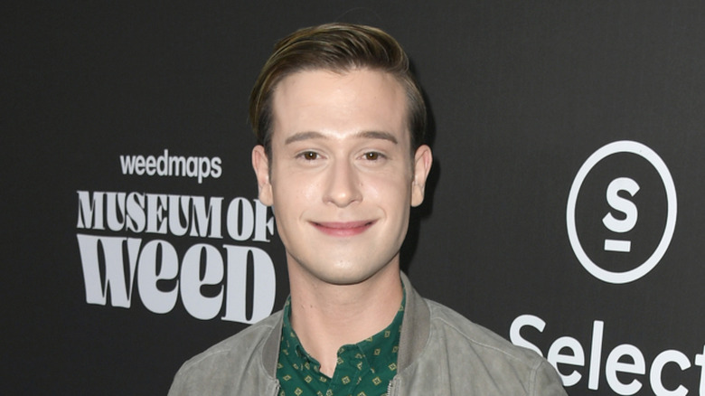 Tyler Henry smiling at Weedmaps Museum of Weed in 2018