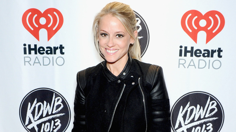 Nicole Curtis posing on iHeart Radio step-and-repeat