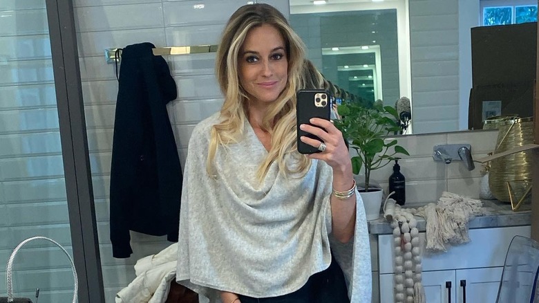 Nicole Curtis taking a bathroom mirror selfie