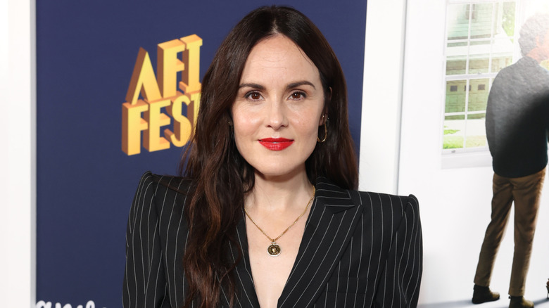 Michelle Dockery posing on step-and-repeat
