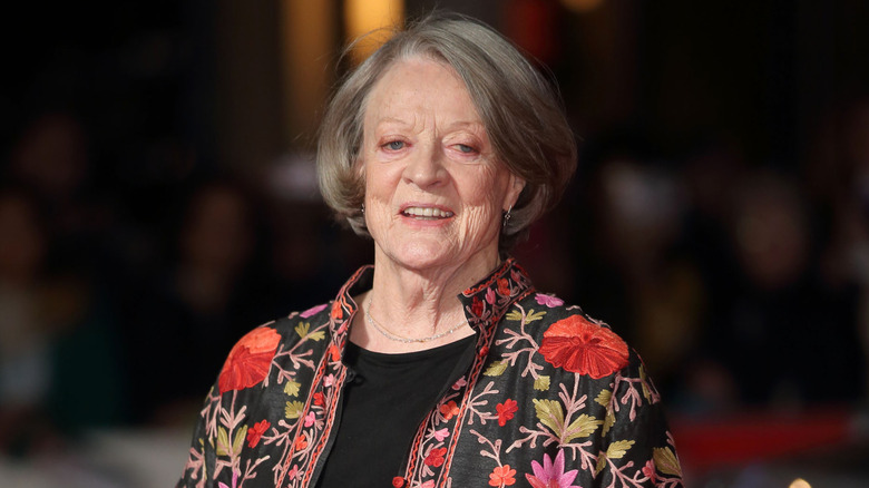 Closeup of Dame Maggie Smith smiling at event