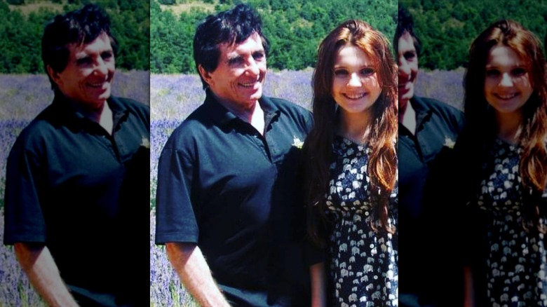 Abigail Breslin smiling with her father in lavender field