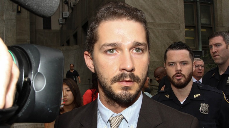 Shia LaBeouf looks tense as his photo is taken