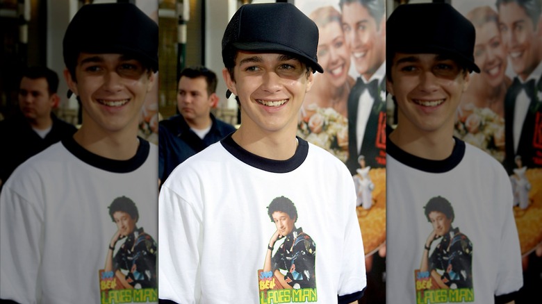 A teenage Shia LaBeouf in graphic T-shirt and oversized baseball cap attends the premiere of "American Wedding"
