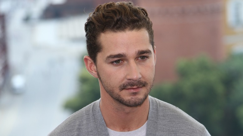 Shia LaBeouf looks serious while attening a film event