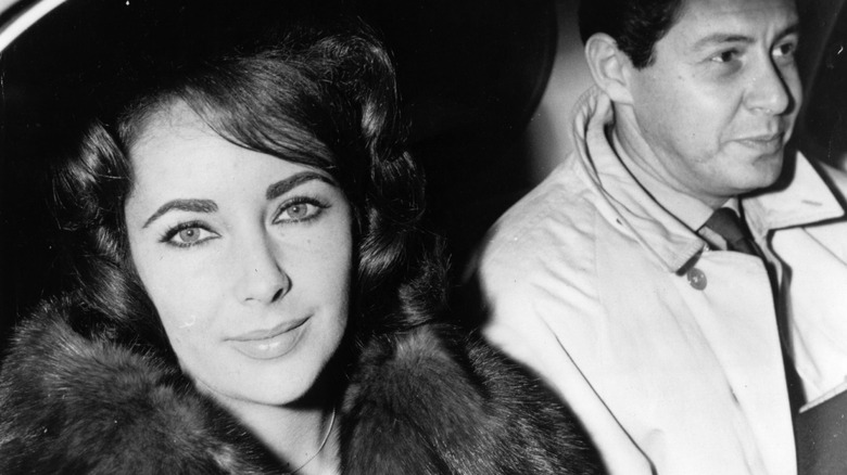 Elizabeth Taylor in a car with Eddie Fisher
