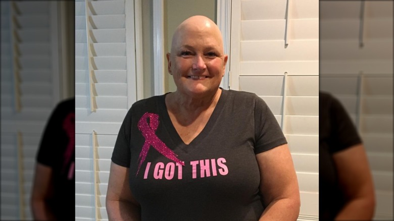 Debbie Rowe in 2016, wearing a shirt with a pink ribbon that says "I Got This"
