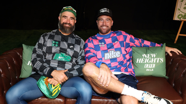 Jason and Travis Kelce sitting on a couch