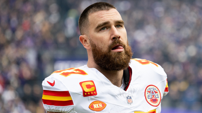 Travis Kelce playing football