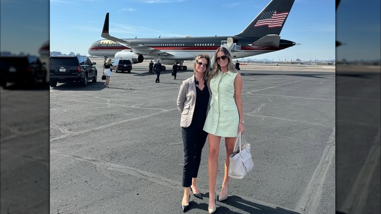 Margo Martin smiles while standing on the tarmac in front of Donald Trump's plane in June 2024 (2024)