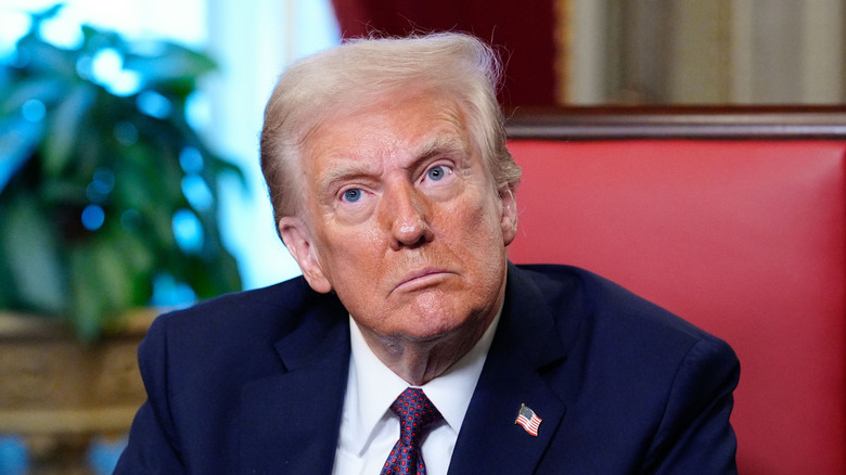 Donald Trump with a bad tan looking upset after his inauguration ceremony