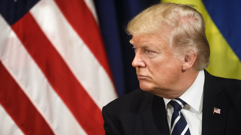 Donald Trump in front of American flag