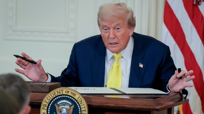 Donald Trump signs a National Purple Heart Day Proclamation in the East Room of the White House (2025)