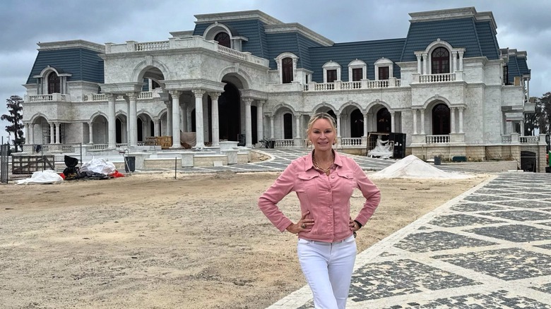 Jackie Siegel outside her Palace of Versailles-esque home in 2025
