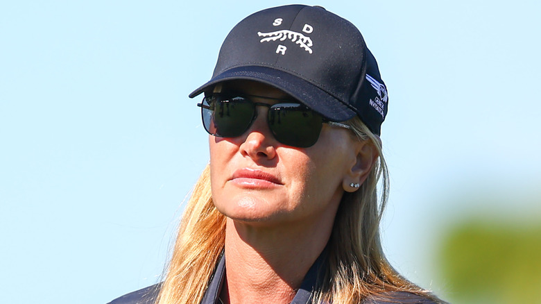 Vanessa Trump wearing a cap and sunglasses