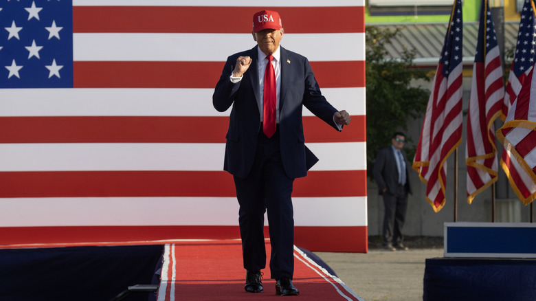 Donald Trump fist dance walking on Iowa stage