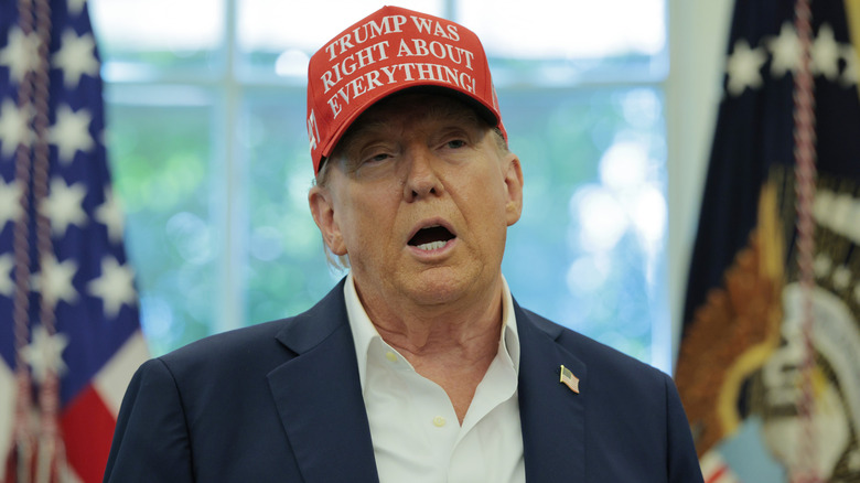 Donald Trump talking in the Oval Office wearing a Trump was right about everything hat