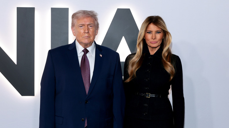 Donald and Melania Trump posing together at a screening of 'Melania'
