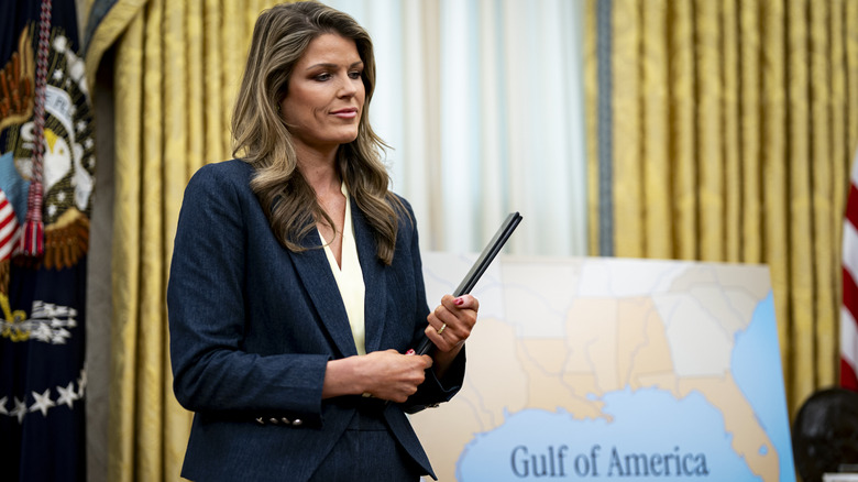 Lindsey Halligan pictured next to a map featuring the Gulf of America