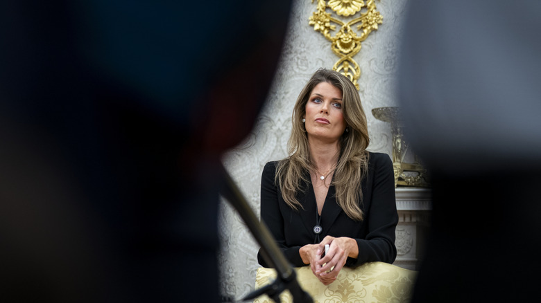 Lindsey Halligan sitting in the Oval Office