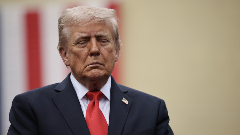 Donald Trump with his eyes closed