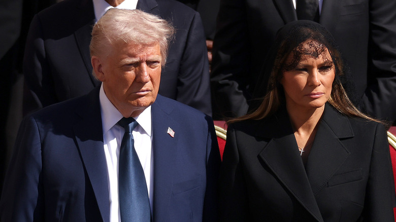 Donald and Melania Trump at a funeral