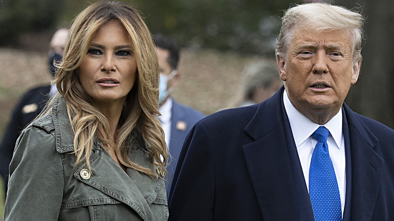 Melania and Donald Trump stand together