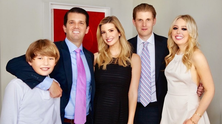 Barron, Donald Jr., Ivanka, Eric, and Tiffany Trump smiling