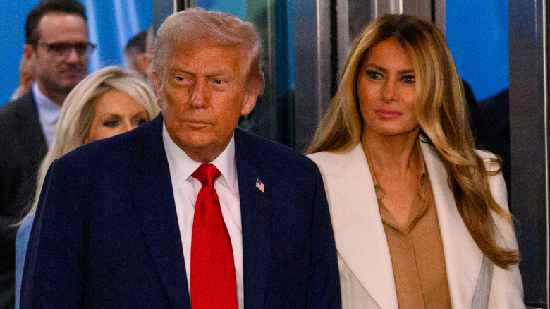 Donald and Melania Trump looking serious