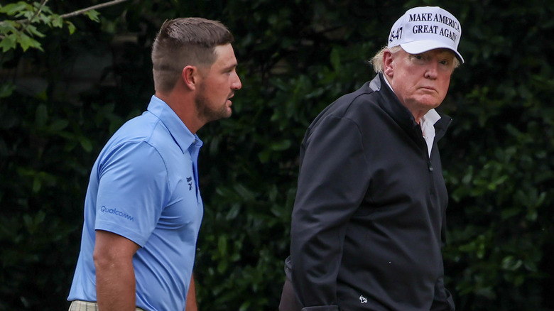 Bryson DeChambeau and President Donald Trump walking to the Oval Office