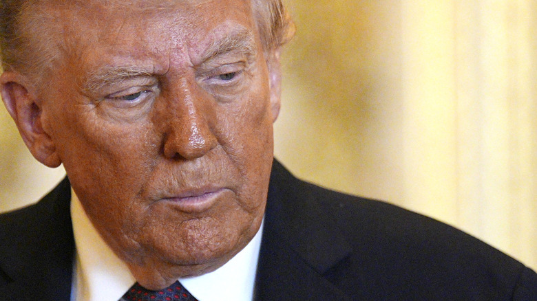 Donald Trump frowning