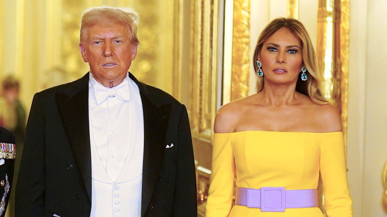 Donald and Melania Trump staring
