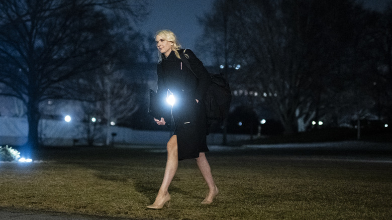 Natalie Harp walking on grass at night