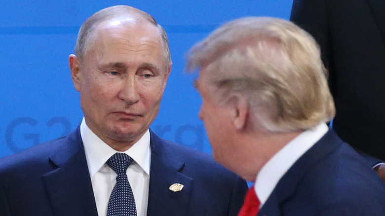 Vladimir Putin giving Donald Trump a withering look
