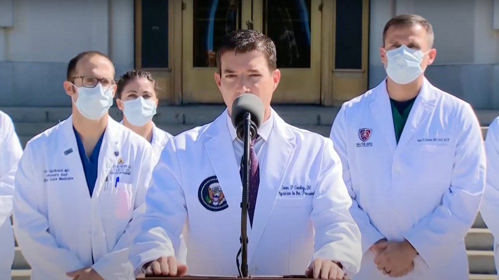 Sean Conley outside Walter Reed Hospital