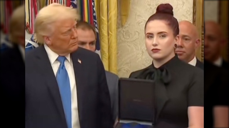 Donald Trump looking at Alexandria Diaz