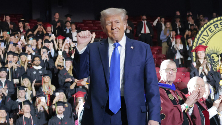 Donald Trump on stage at the 2025 University of Alabama graduation ceremony