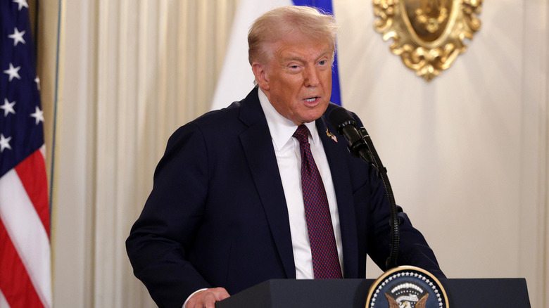 Donald Trump speaking during a press conference with Benjamin Netanyahu