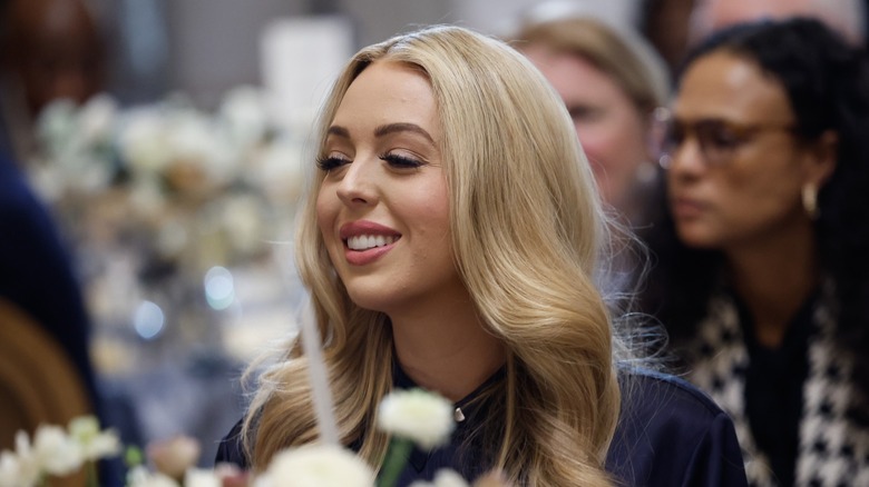 Tiffany Trump smiling and looking off to the side