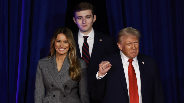 Melania, Barron, and Donald Trump smiling