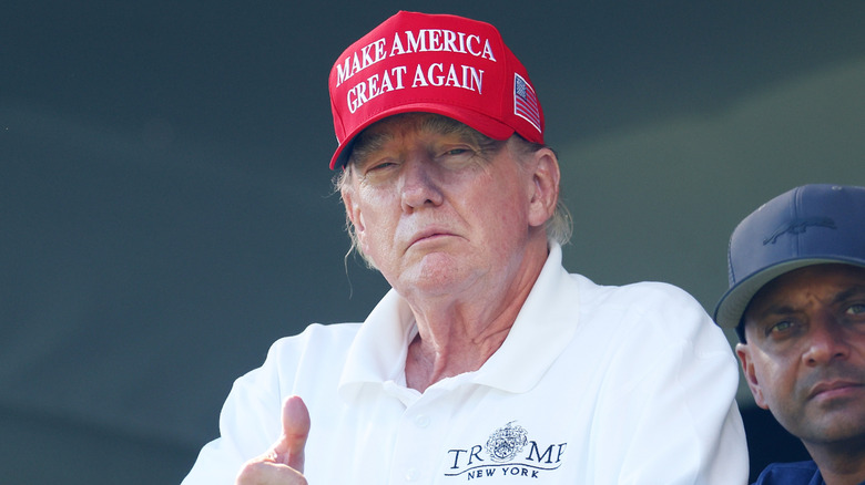 Former President Donald Trump looks on at the LIV Golf Invitational - Bedminster