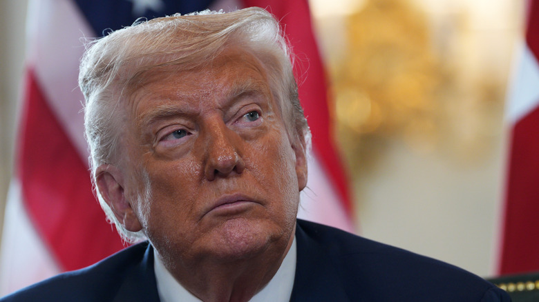 President Donald Trump looking off