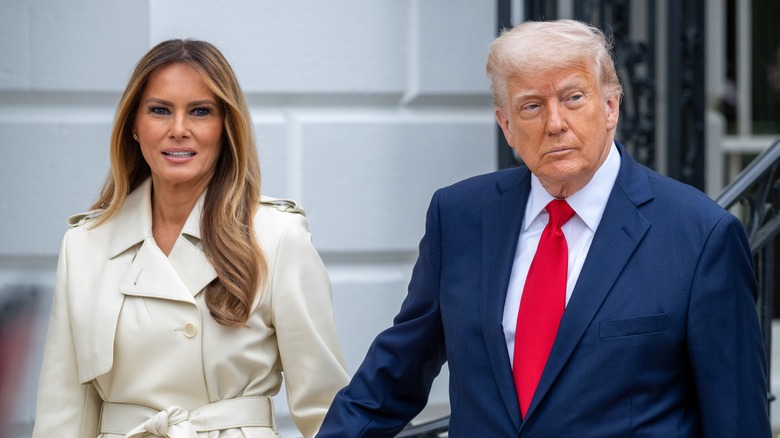 Melania Trump and Donald Trump standing side-by-side at the White House Easter egg roll