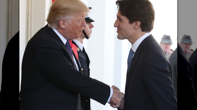 Donald Trump awkwardly shakes hands with Justin Trudeau