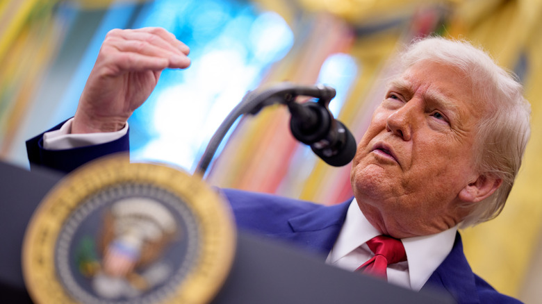 Donald Trump speaking at podium