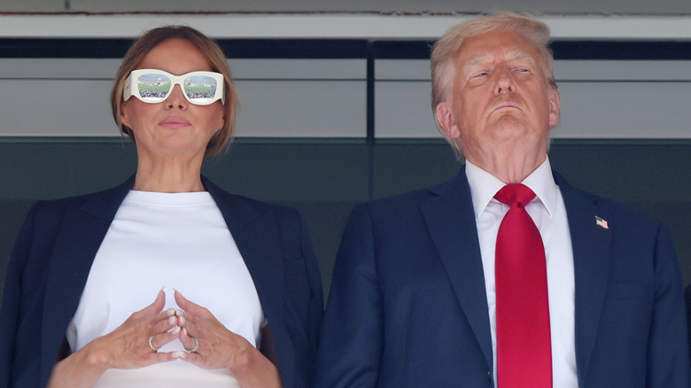 Melania and Donald Trump staring